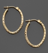 The perfect every day accent for your composed ensemble, these pretty oval hoop earrings are crafted in 14k gold. Approximate diameter: 1/2 inch. Approximate diameter: 3/4 inch.