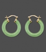 Go for a smooth and calming look with these beautiful jade hoop earrings set in 14k gold. Approximate diameter: 1 inch.