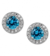 Blue perfection. B. Brilliant's pretty circular stud earrings feature round-cut London blue cubic zirconias encircled by round-cut clear zirconias (3 ct. t.w.) set in sterling silver. Approximate diameter: 3/8 inch.