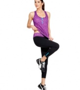 Get active in Ideology's sporty active pants, featuring a shock of color at the waistband and zippers at the hem!