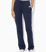 Perfect for casual lounging and workouts alike, Lauren by Ralph Lauren's sleek athletic pant is designed from a stretch cotton-blend for comfort and ease of movement.