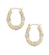 Notched accents give these hoop earrings a segmented look. Set in 14k white and yellow gold.