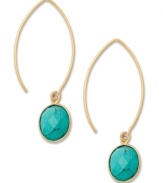 Tried and true, turquoise is an undying trend. Studio Silver's pretty drop earrings feature oval-cut simulated turquoise in 18k gold over sterling silver. Approximate drop: 2 inches.