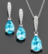 Make an impact with dramatic drops of piercing pear-shaped blue topaz (6-3/8 ct. t.w.). Necklace and earrings set in sterling silver. Approximate length: 18 inches.