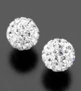 These radiant stud earrings feature round-cut Swarovski crystallized elements on 14k white gold to capture the splendor of the fine jeweler's eponymous ball. Each measures approximately 5mm.