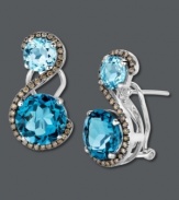 A pair of perfectly, complementary colors. Le Vian's two-stone drop earrings combine two round-cut blue topaz gemstones (7-5/8 ct. t.w.) with swirls of round-cut chocolate diamonds (3/8 ct. t.w.). Set in 14k white gold. Approximate drop: 1 inch.