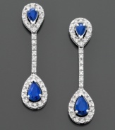 These luxurious drop earrings make a glam statement. Teardrop-cut sapphires (9/10 ct. t.w.) and round-cut diamonds (1/3 ct. t.w.) are set in 14k white gold. Drop measures 1-1/4 inches.