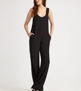 Trend-forward jumpsuit fashioned with a plunging scoopneck, slash pockets and an unexpected scoopback. Plunging scoopneckWide strapsSlash pocketsLow scoopbackInseam, about 35ViscoseDry cleanImported of Italian fabricModel shown is 5'11 (180cm) wearing US size Small.