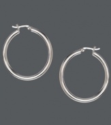 Simple hoops add an extra special touch, and Touch of Silver's smooth style is no exception. Crafted in silver-plated brass with a sterling silver click backing. Approximate diameter: 1-2/5 inches.