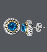 Stud earrings provide the perfect versatile accessory. These dazzling earrings feature a sterling silver setting with 14k gold rope edging that highlights a round-cut blue topaz (2 ct. t.w.). Approximate diameter: 3/8 inch.