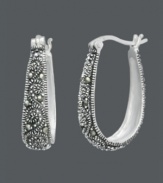 Free-spirited style with bohemian savvy. Genevieve & Grace hoop earrings feature glittering marcasite scrolls set in sterling silver. Approximate diameter: 15/16 inch.