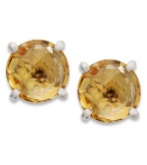 Pops of sunshine-bright color add life to your look. Set in sterling silver posts sits brilliant round-cut citrine (6 ct. t.w.). Approximate diameter: 1/2 inch.