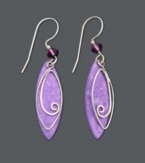 Make a pristine statement in purple. These delicate drop earrings by Jody Coyote feature purple patina brass leaves with an intricate wire charm in sterling silver and purple glass bead accents. Set in sterling silver. Approximate drop: 1-3/4 inches.