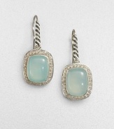 From the Noblesse Collection. A pretty aqua chalcedony cabochon center surrounded by a diamond accented border set in sleek sterling silver. Aqua chalcedonyDiamonds, .42 tcwSterling silverLength, about .39Hook backImported 