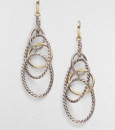 A coming together of the cabled and the smooth, the oval and the circle, sterling silver and 18k gold, in a delicate linked design that dangles with mobile grace. 18k yellow gold and sterling silver Drop, about 2½ Ear wire Made in Italy