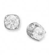 Traditional diamond stud earrings with an intricate twist. Each pair features a bezel-set diamond in the side, as well as a round-cut diamond at front (total 2 ct. t.w.). Crafted in a 14k white gold post setting. Approximate diameter: 6 mm.