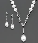 Smooth style that raises the bar. This gorgeous pendant and earring set features cultured freshwater pearls (5-9 mm) set in sterling silver. Pendant measures approximately 15 inches with a 2-inch drop. Earrings measure approximately 3/4 inch.