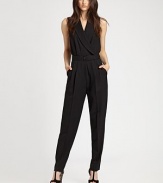 A stunning silhouette rendered in rich wool suiting with standout details like a sheer back panel, front pleats and flattering tapered legs.V-neckWrap frontSleevelessPull-on style with belted waistSide slash pocketsRise, about 9½Inseam, about 30About 64 from shoulder to hemFully linedWoolDry cleanImportedModel shown is 5'10 (177cm) wearing US size 4. 