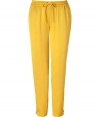 Stylish pants in fine, pure viscose - Sumptuously soft, lightweight material in a vibrant, on-trend shade of yellow - Slim yet relaxed, low rise cut - Gathered drawstring waist - Slash pockets at sides, welt pockets at rear - Fashionable 7/8 length crops at ankles - Casually elegant, easily dressed up or down - Pair with a fitted t-shirt and leather sandals, or try a silk tank, blazer and wedges