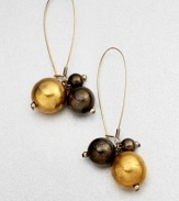 A lovely mix of gunmetal-finished and 18k goldplated spheres in a cluster design. Brass18k goldplated brassLength, about 2.75French wire backMade in USA 