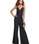 RACHEL Rachel Roy's jumpsuit features bare shoulders and wide legs to create a balanced but totally dramatic look!