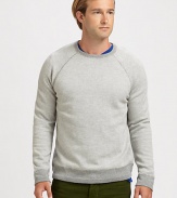 Defined by expert craftsmanship and attention to detail, this modern crewneck sweater features exposed seams, ribbed knit trim and a textured finish for a heritage-inspired feel.CrewneckBanded cuffs and hem70% wool/30% cashmereMachine washImported