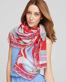 Wrap yourself up in a little bit of paradise with a vibrant floral print scarf from Emilio Pucci.