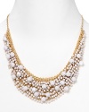 Brighten up every outfit with this layered beaded bib necklace from Cara accented by a dramatic collar of white stones.