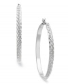 A textured design adds appeal to this classic hoop earring from Charter Club. Crafted in silver tone mixed metal. Approximate drop: 1-1/2 inches.