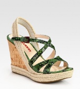 Python stamped leather criss-cross design with an espadrille slingback and cork wedge. Cork and hemp wedge, 4 (100mm)Cork and hemp platform, 1 (25mm)Compares to a 3 heel (75mm)Python stamped leather and hemp upperLeather liningRubber solePadded insoleImported