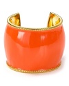 All the right cuff: Belle Noel's orange enamel bracelet is bright and bold. No need to stack, this style's the perfect choice for standout statement-making.