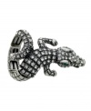 Call it animal attraction. This chic alligator cocktail ring by GUESS is the must-have of the season. Crafted in oxidized silver tone mixed metal with sparkling crystal accents and green crystal eyes. Rings stretches to fit finger.