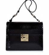 Give dressy day to evening looks an exquisitely luxurious polish with Salvatore Ferragamos jet black python shoulder bag - Flap with hinged logo lock closure, key attached to strap, gold-toned logo hardware, black leather interior, zippered back wall sectional pocket - An elegant accessory destined to be a multi-season gem