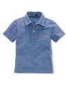 An adorable pocketed polo shirt is crafted from super-soft cotton jersey for a breathable, comfy fit.