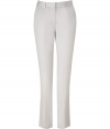 These sophisticated Paul Smith pants channel classic preppy-chic with modern styling - Figure-hugging silhouette, zip front, belt loops, side slash pockets, back button welt pockets, one with contrasting trim detail, cropped - Style with a button down blouse, a boyfriend cardigan, and platform pumps