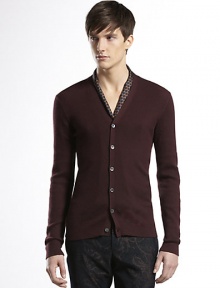 Cashmere ribbed-knit cardigan with leather tab detail on the side.V-neckFull button-downCashmereDry cleanMade in Italy