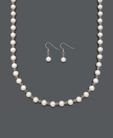 The perfect pairing for everlasting style. Every girl needs a cultured freshwater pearl (8-9 mm) and sterling silver necklace and earrings set in her collection. Approximate length: 18 inches. Approximate drop: 1-1/4 inches.