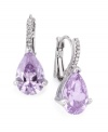 Accompany your ensemble with the perfect accessory in eye-popping pastel. City by City earrings feature amethyst-colored cubic zirconia teardrops (10-1/4 ct. t.w.). Lever back closure and setting crafted in silver tone mixed metal with clear cubic zirconia accents. Approximate drop: 3/4 inch.