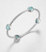 From the Renaissance Collection. Let this beautiful piece take you back in time with cabochon aqua chalcedony stations on an iconic sterling silver cable design. Aqua chalcedonySterling silverDiameter, about 2.25Slip-on styleImported 