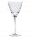 An intricate bias check pattern on this crystal wine glass adds sparkling sophistication to an elegant evening.