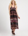 An exotic print meets an elongating, maxi design for the perfect coverup. Smocked topSleevelessCottonHand washImported