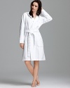 Bring the spa home in a plush terry velour short robe with hood.