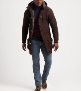 An interesting balance of tradition and modernity, this classic duffel coat silhouette is knitted in a superior wool blend with faux-fur lining for a warm, toasty feel.Button-frontStand collarAttached hoodWaist welt, hip flap pocketsFully linedAbout 35 from shoulder to hem80% wool/20% nylonHand washMade in Italy