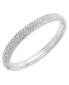 Every look should have a little bit of shine. Eliot Danori's stunning flat-banded bangle incorporates a pave-set pattern of round-cut crystals. Set in silver tone mixed metal. Approximate diameter: 2-2/8 inches.