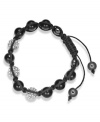 Spiritual-inspired bracelets are all the rage this season! Snap up this hot style from Ali Khan featuring semi-precious black agate beads and pave glass fireballs on a trendy black cord. Bracelet adjusts to fit the wrist. Approximate diameter: 2 inches. Approximate length: 12-1/4 inches.