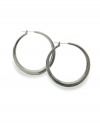 Style&co.'s tapered hoop earrings are a versatile, casually classic look that works for any time of year. Made in hematite tone mixed metal. Approximate diameter: 1-1/4 inches.