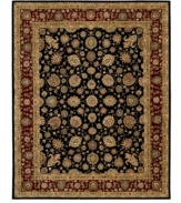 Introduce a combination of elegant Persian and European designs to your traditional home décor with this remarkable Nourison area rug. Hand-tufted with exceptional technique, this natural wool area rug features strands of genuine silk for exquisite detail that redefines luxury.