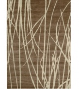 Blades of tall marsh grass sway in silhouette across a field of organic brown. Carefully woven using textured yarns combined with a distinct palette of rich, blended earth tones, this Calvin Klein makes modern design accessible to everyone.