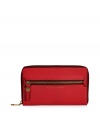 Tote around your travel essentials in style with this red leather wallet from Marc by Marc Jacobs - Zippered front pocket, embossed logo, zip-around closure, multiple card slots and zippered inside pocket - Perfect for keeping organized on vacation or giving as a sleek holiday gift