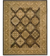 Introduce a combination of elegant Persian and European designs to your traditional home décor with this remarkable Nourison area rug. Hand-tufted with exceptional technique, this natural wool area rug features strands of genuine silk for exquisite detail that redefines luxury.